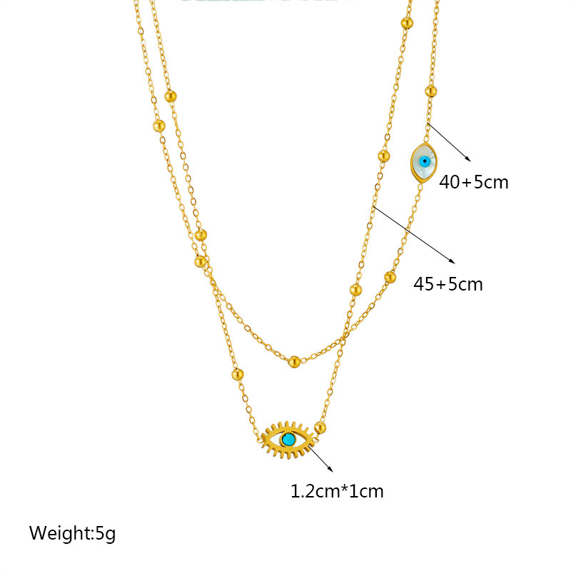 European and American niche fashion design double-layer mixed chain gold bead titanium steel drip oil hollow blue eye pendant necklace
