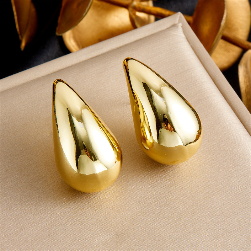 European and American style, high-end, gold-plated hollow teardrop pendant stainless steel earrings, bracelets, and necklace set