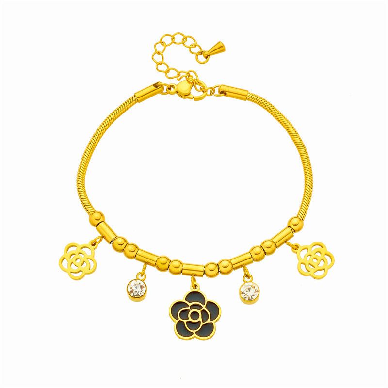 Niche design, stylish and minimalist French retro style, hollowed-out camellia pendant with diamond setting, titanium steel chain.