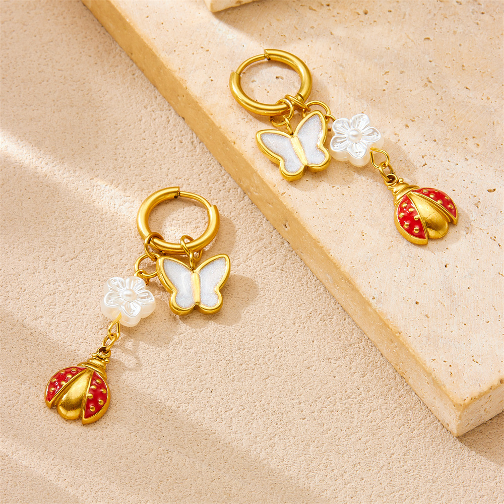 Cross-border fashion, unique and trendy multi-element conch shell stainless steel dripping fruit butterfly pendant earrings