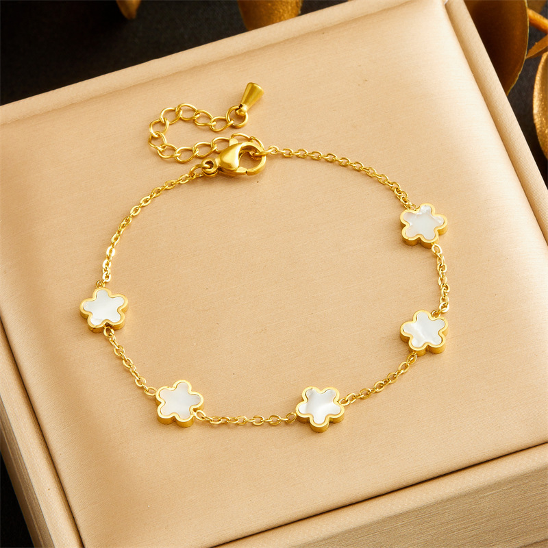 European and American style retro minimalist gold-plated white shell flower accessory chain stainless steel three-piece jewelry set