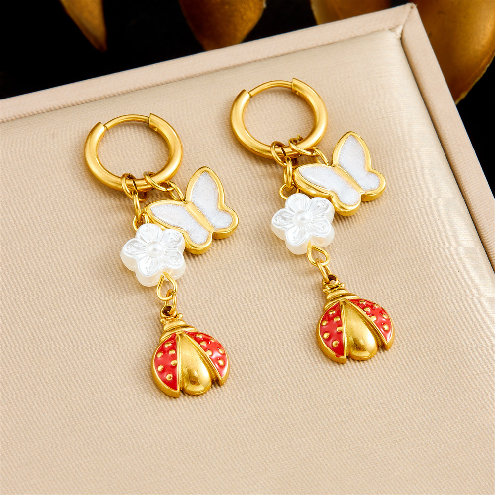 Cross-border fashion, unique and trendy multi-element conch shell stainless steel dripping fruit butterfly pendant earrings