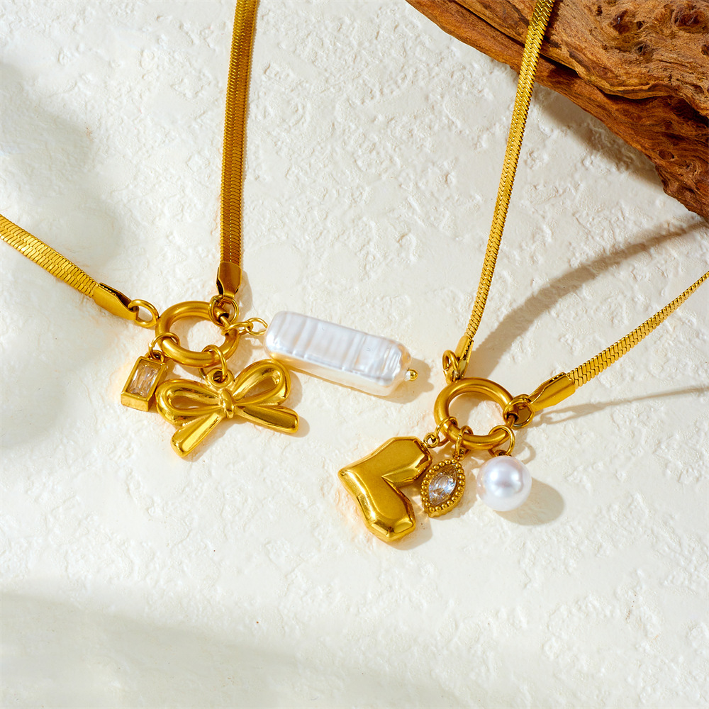 Cross-border fashion, elegant retro gold-plated stainless steel chain bow heart pearl pendant necklace
