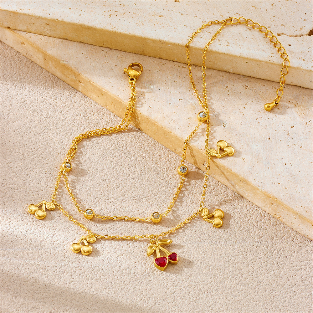Korean style, fashionable, sweet, versatile, diamond-encrusted heart-shaped cherry pendant, double-layered stainless steel chain, gold-plated anklet.