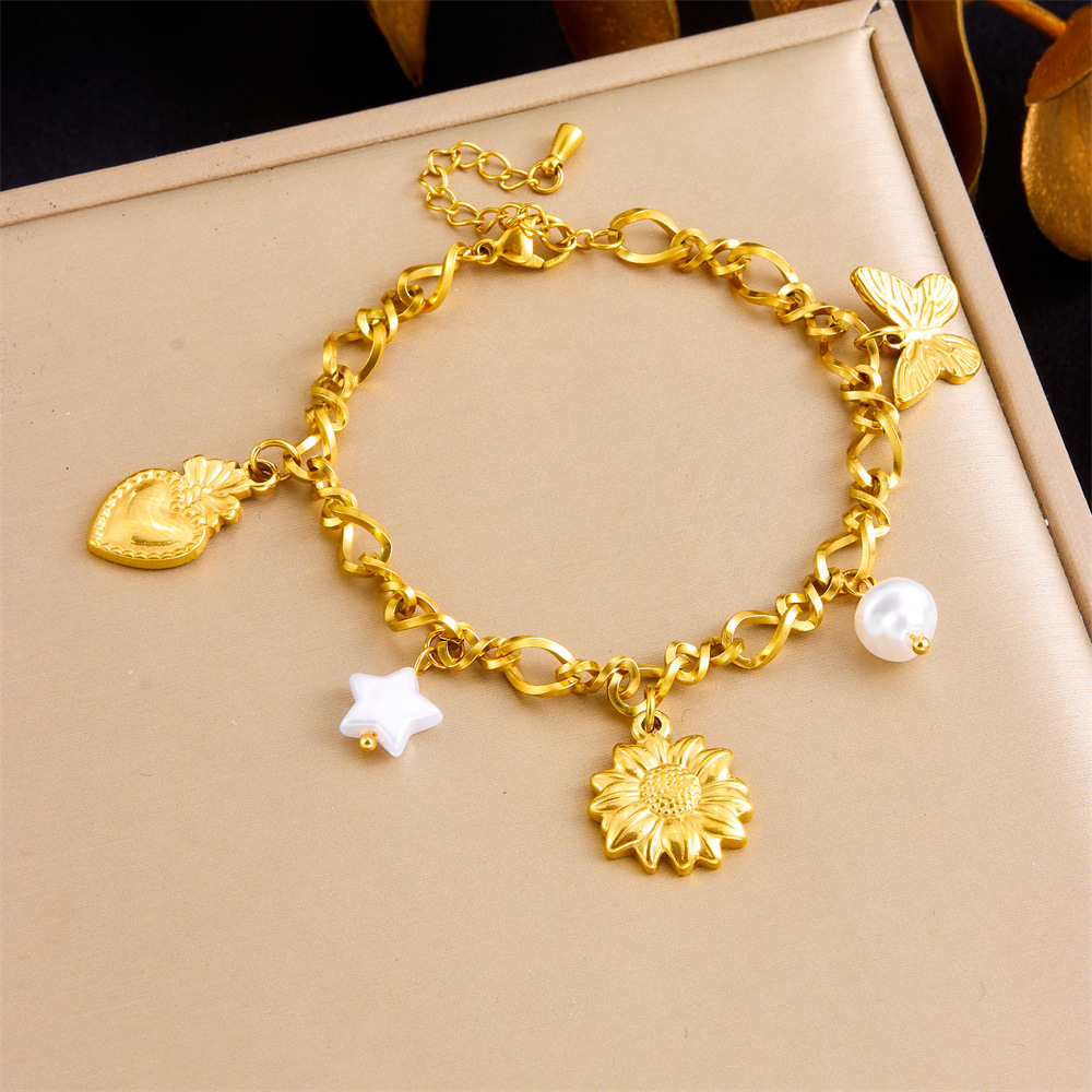 Cross-border fashion gold-plated stainless steel multi-element white shell pendant chain bracelet with five-pointed star, sunflower, heart and butterfly elements.
