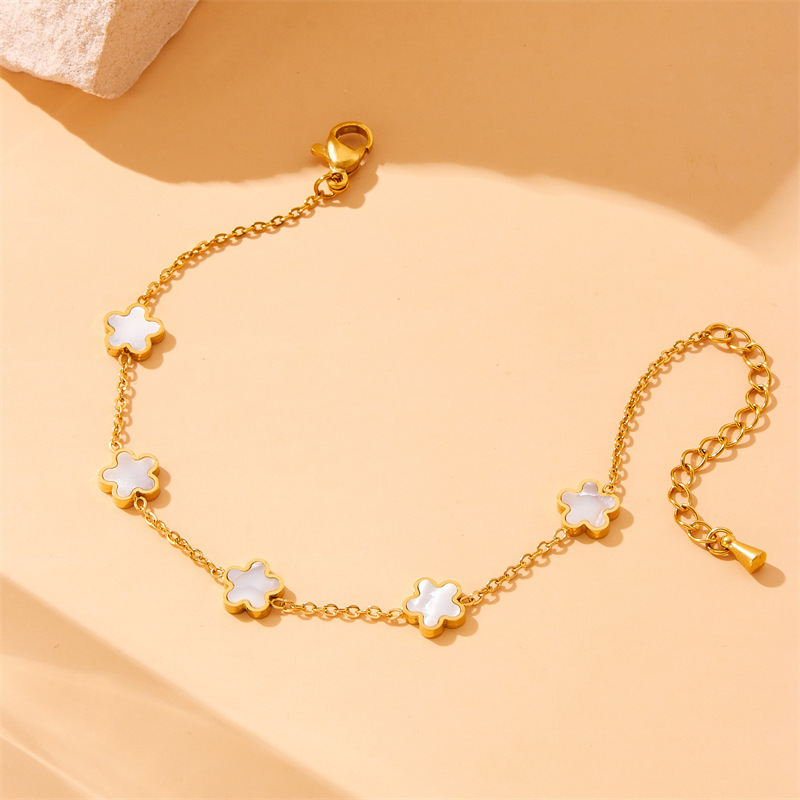 European and American style retro minimalist gold-plated white shell flower accessory chain stainless steel three-piece jewelry set