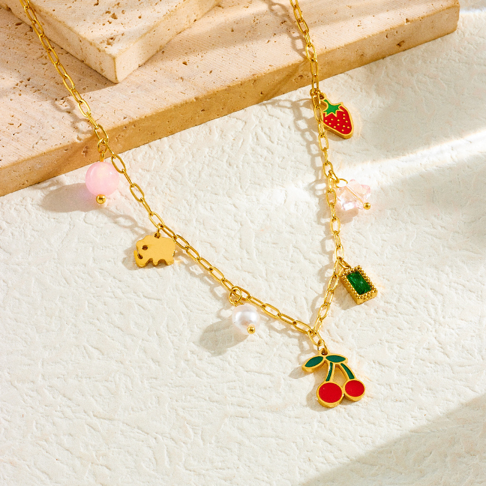 Fashionable, sweet, fresh, and pastoral style stainless steel necklace with multi-element pearl fruit pendant featuring cherry and strawberry designs.
