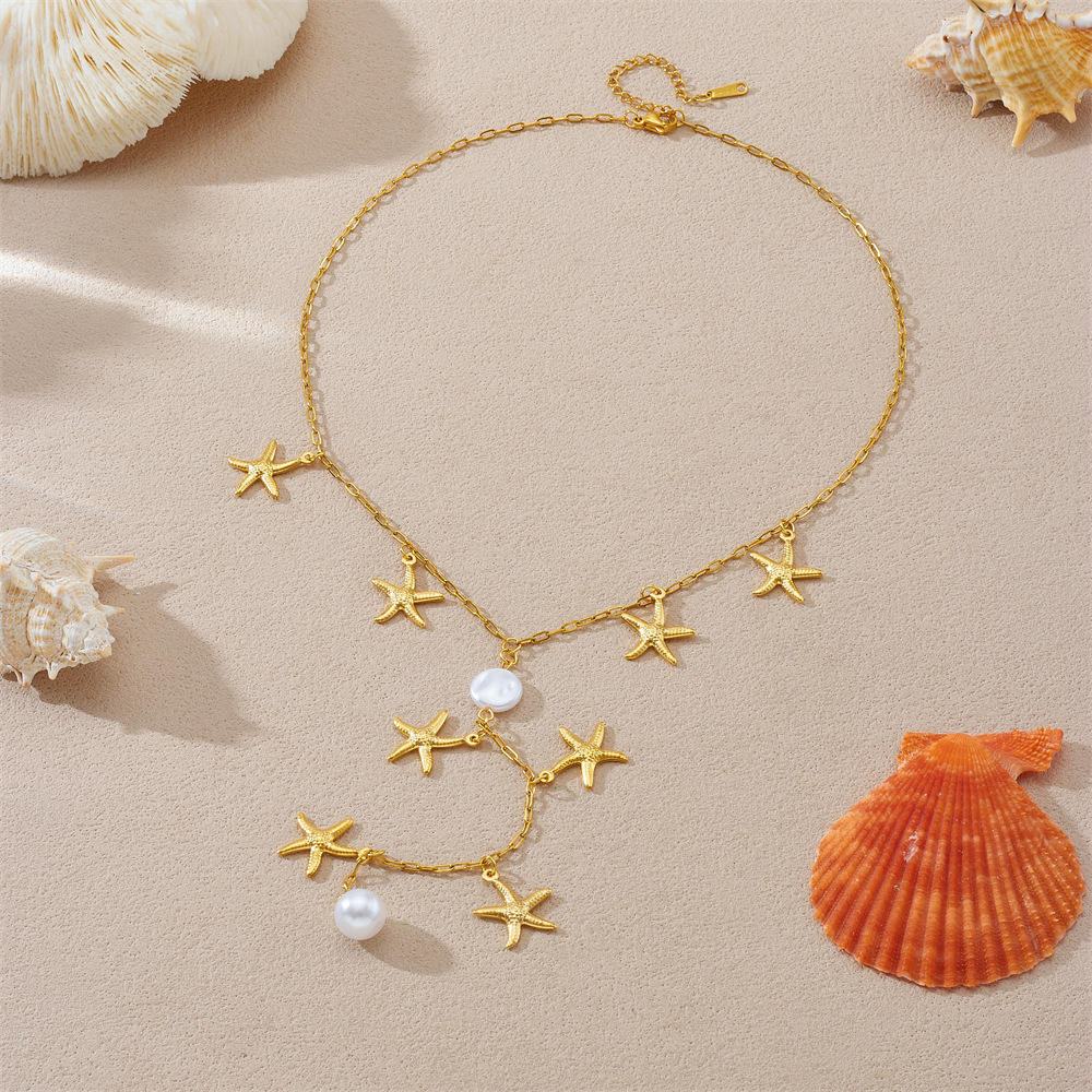 Stylish, versatile, minimalist, irregular Y-shaped chain with gold-plated pearl, starfish, and stainless steel pendant tassel necklace.