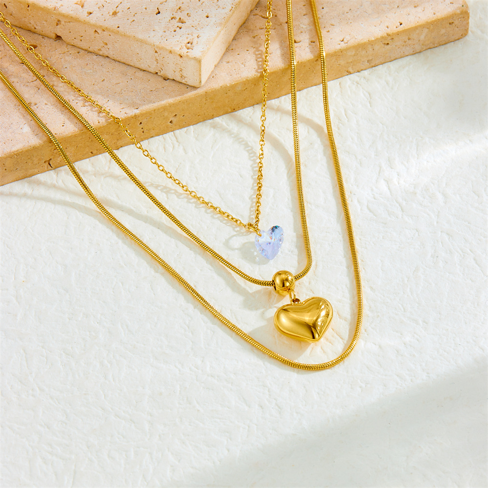 Cross-border fashion minimalist layered chain stainless steel heart pendant gold-plated women's snake bone necklace