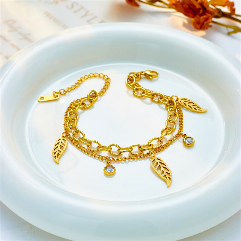 Korean style, minimalist and fashionable, niche titanium steel metal double-layer chain leaf with rhinestone pendant jewelry accessories bracelet