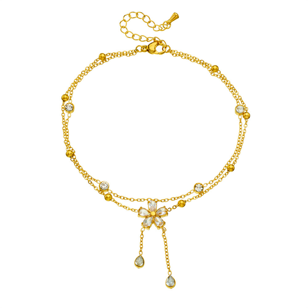 New fashionable diamond-encrusted five-petal flower chain with tassels, double-layered stainless steel gold-plated delicate chain anklet.