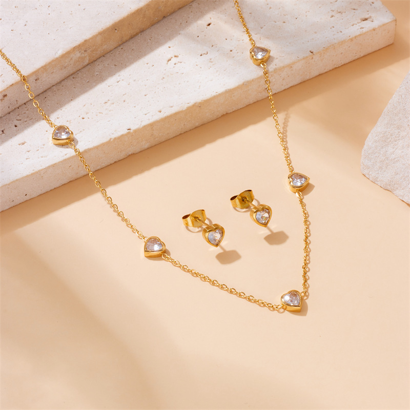 Korean style, fashionable, minimalist, niche, diamond-encrusted transparent heart accessory pendant necklace earrings stainless steel gold-plated set