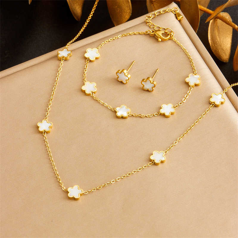 European and American style retro minimalist gold-plated white shell flower accessory chain stainless steel three-piece jewelry set