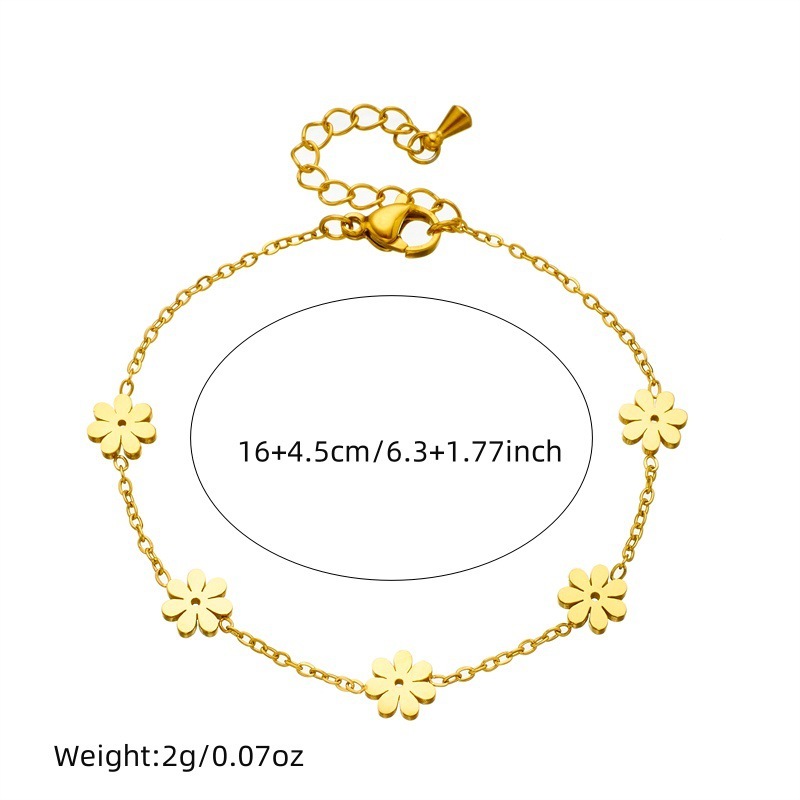 European and American cross-border fashion versatile high-end glossy gold-plated stainless steel daisy flower earrings, bracelets, and necklace set