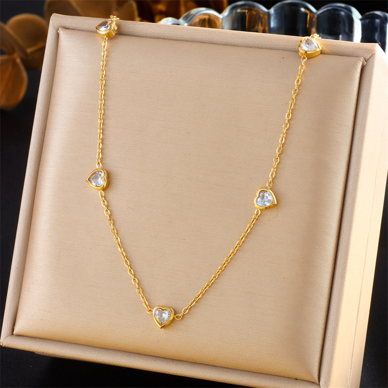 Korean style, fashionable, minimalist, niche, diamond-encrusted transparent heart accessory pendant necklace earrings stainless steel gold-plated set