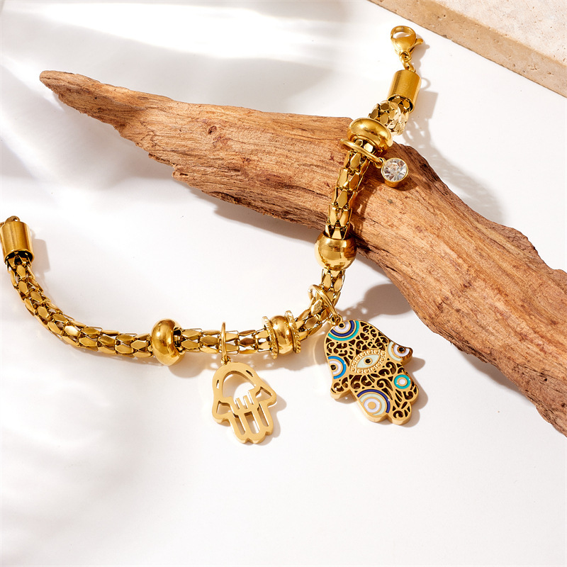 European and American style retro design gold-plated titanium steel metal drip pattern palm pendant cylindrical chain bracelet