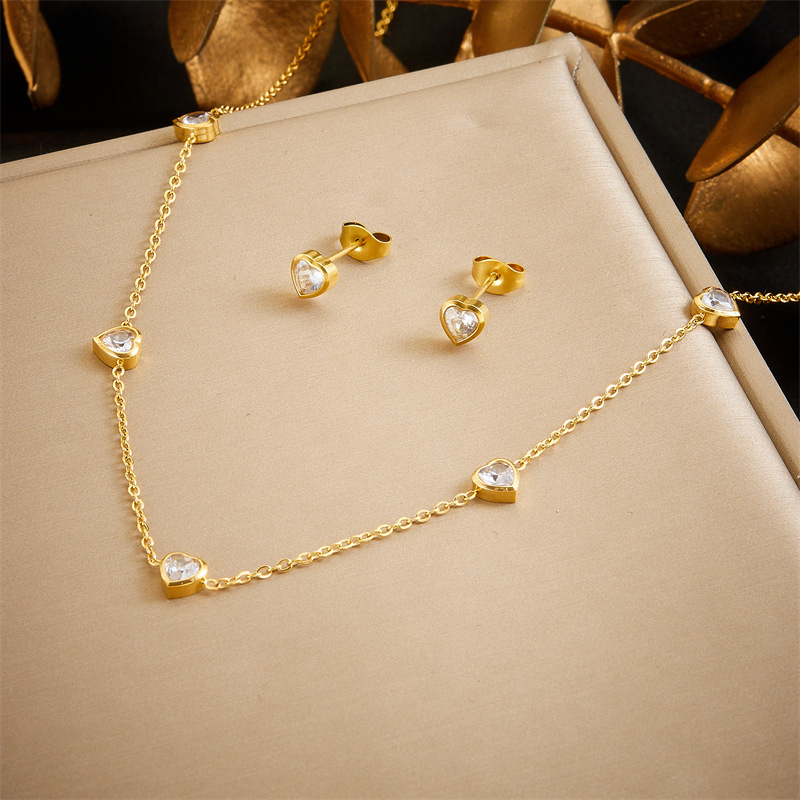 Korean style, fashionable, minimalist, niche, diamond-encrusted transparent heart accessory pendant necklace earrings stainless steel gold-plated set