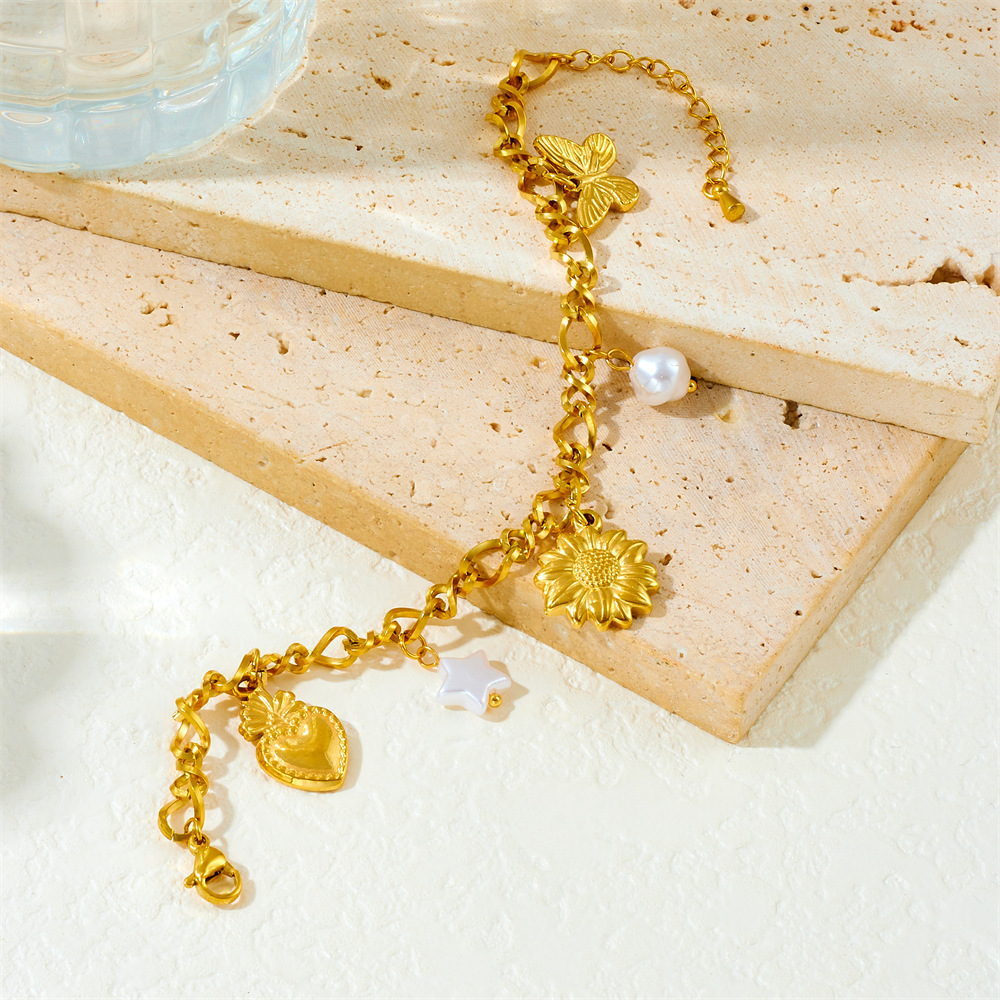 Cross-border fashion gold-plated stainless steel multi-element white shell pendant chain bracelet with five-pointed star, sunflower, heart and butterfly elements.