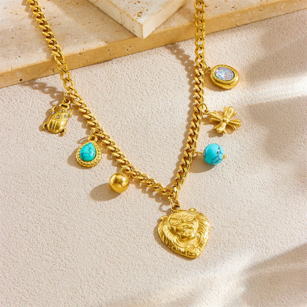 New European and American style retro animal accessories: lion head ladybug cross blue turquoise pendant chain stainless steel necklace