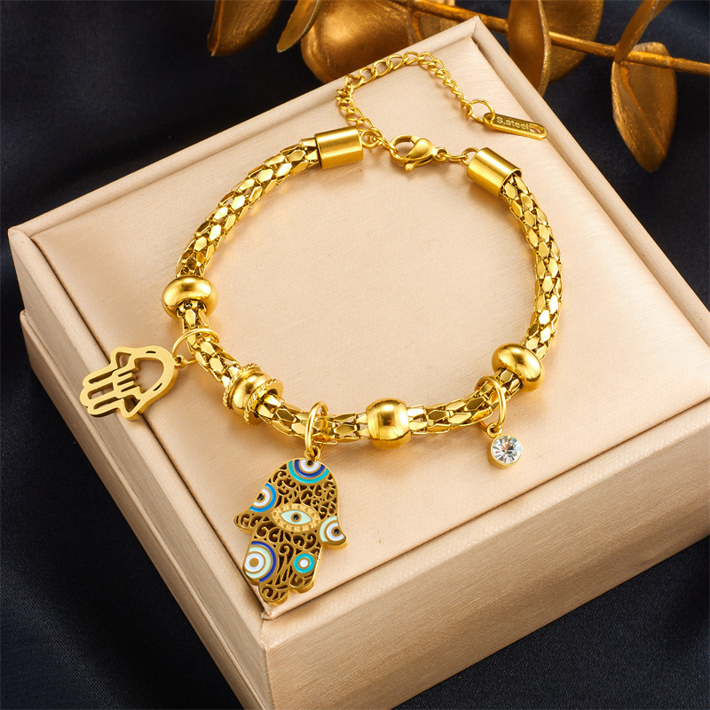 European and American style retro design gold-plated titanium steel metal drip pattern palm pendant cylindrical chain bracelet