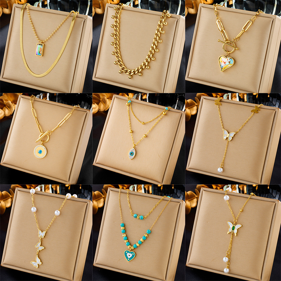 Fashionable, niche, creative, minimalist pearl butterfly rainbow rhinestone heart pendant tassel chain multi-layer necklace