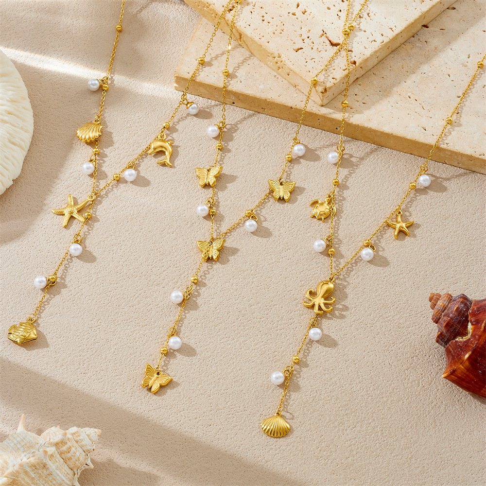 Korean-style, fashionable, minimalist design, beach vacation style, multi-element accessory, Y-shaped chain, stainless steel butterfly and starfish necklace.