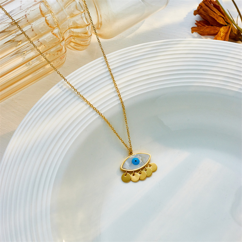 European and American style, unique and fashionable, creative niche design, round tassel oval blue eye pendant stainless steel chain necklace