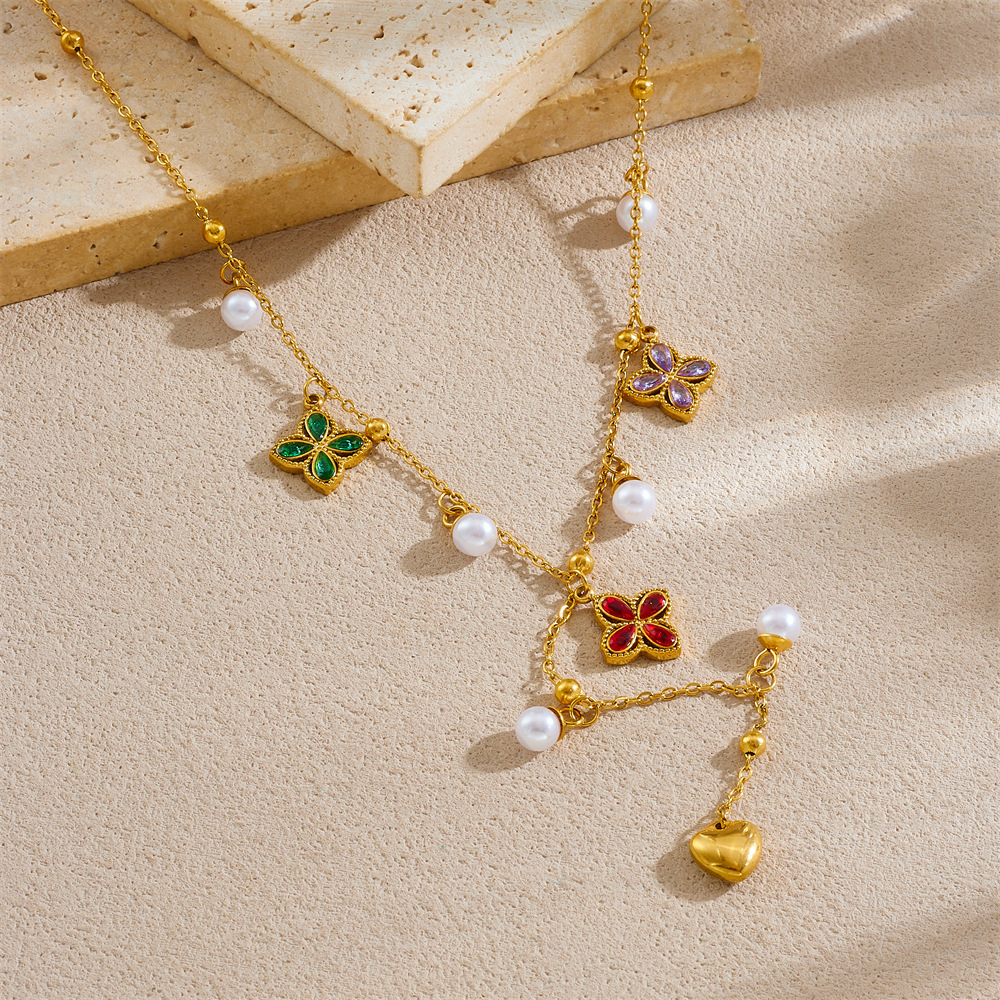 Chic and stylish commuter necklace with colorful flowers, diamonds, and pearls; Y-shaped chain; stainless steel jewelry.