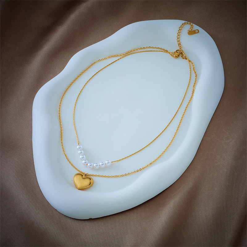 New European and American style light luxury double-layer pearl three-dimensional heart pendant necklace, elegant and simple clavicle chain