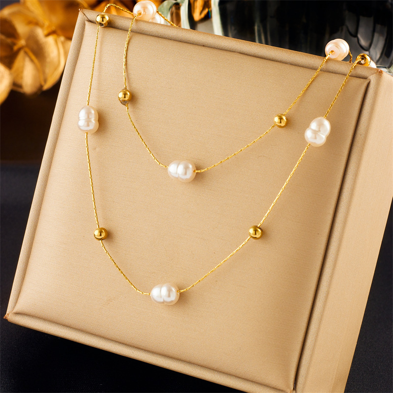 European and American minimalist, elegant, retro, versatile gold round pearl delicate chain double-layer titanium steel clavicle necklace