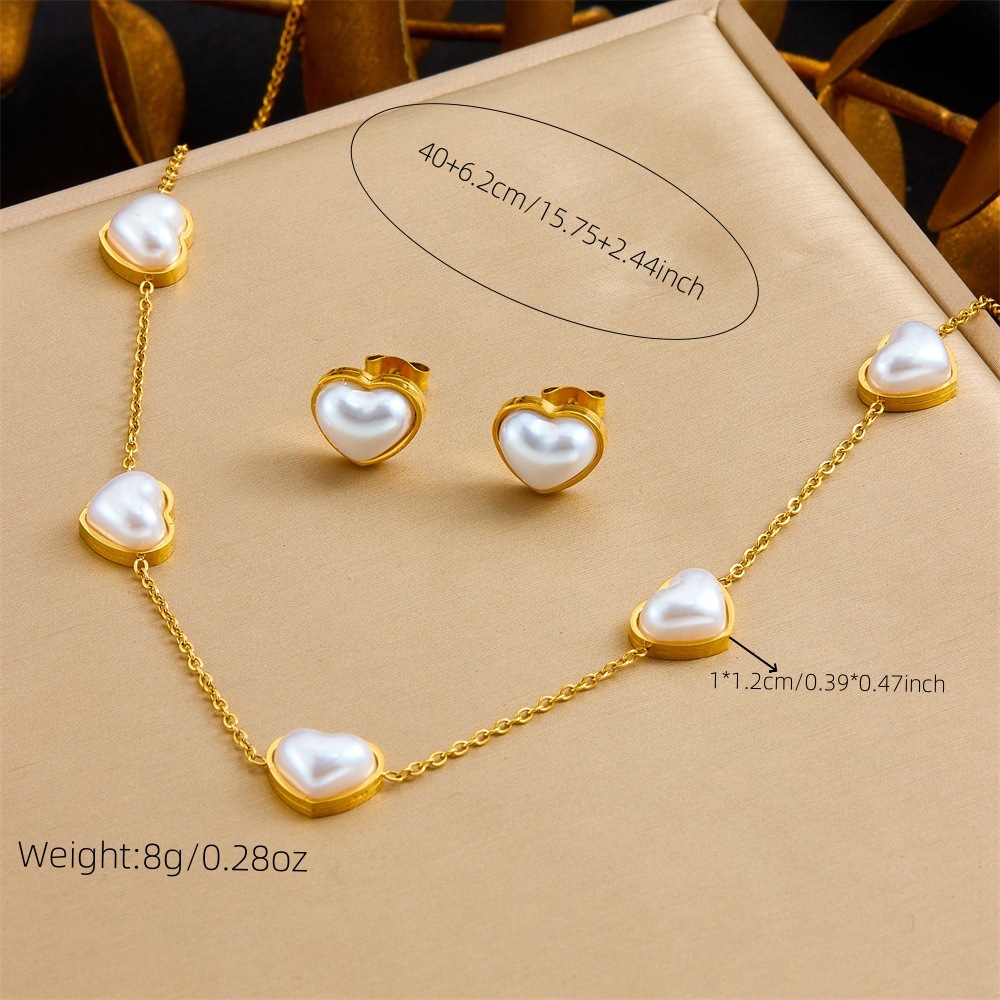 Stylish and minimalist French retro pearl heart gold-plated stainless steel O-chain bracelet, earrings, and necklace set.