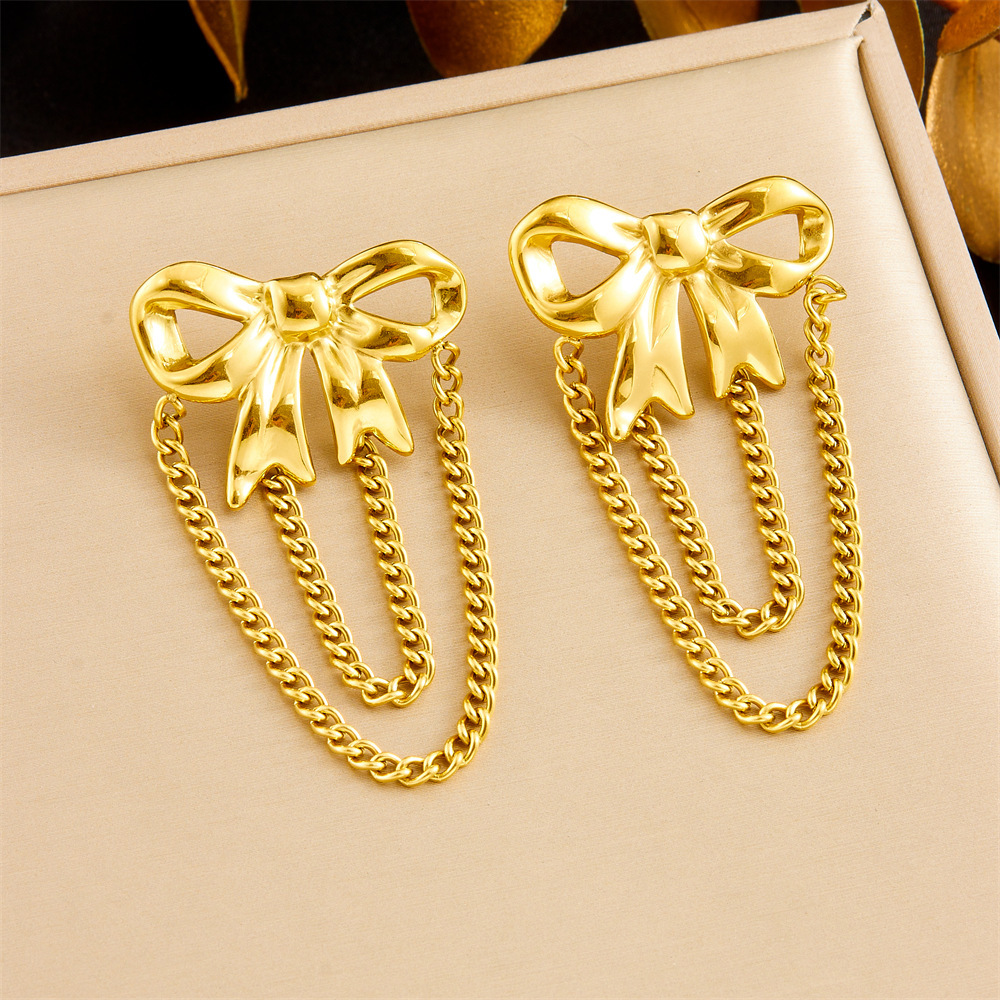 Cross-border fashion gold-plated diamond-encrusted sun heart flower bow tassel stainless steel light luxury high-end women's earrings