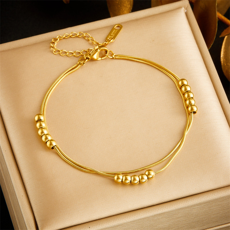 European and American style, simple and versatile, double-layered, beaded chain stainless steel jewelry set, bracelet and necklace.