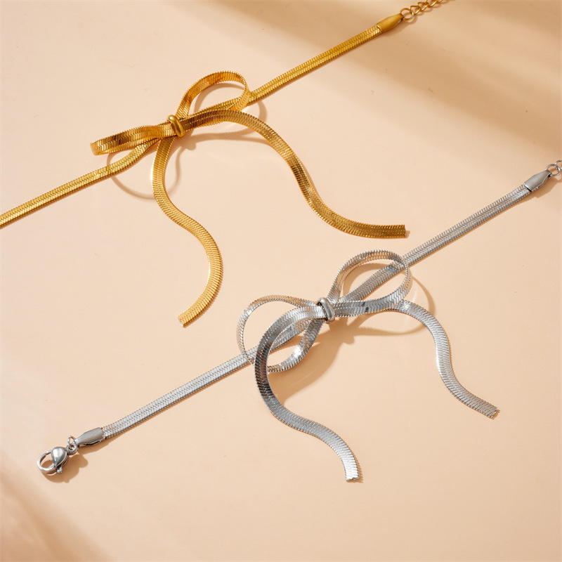 Cross-border fashion minimalist design gold-plated stainless steel bow snake chain accessory bracelet