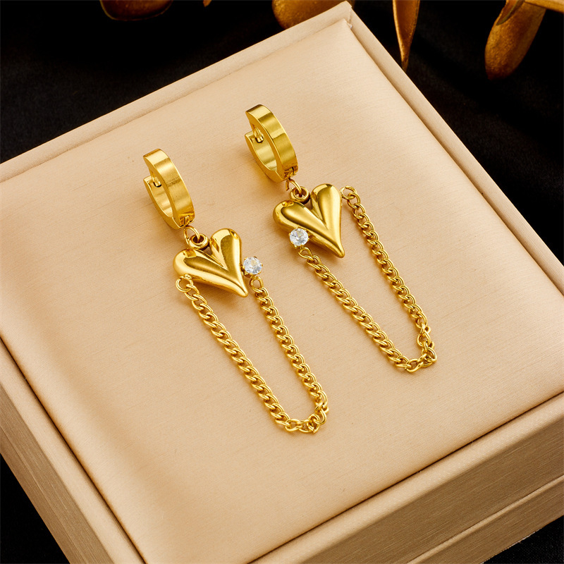 Stylish, sophisticated, and luxurious long chain earrings with diamond-encrusted heart pendant, gold-plated titanium steel.