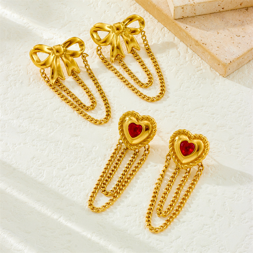 Cross-border fashion gold-plated diamond-encrusted sun heart flower bow tassel stainless steel light luxury high-end women's earrings