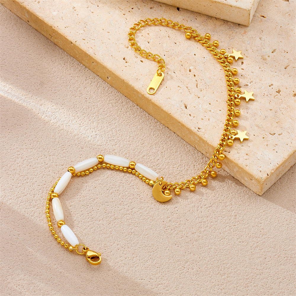 Fashionable and unique double-layer chain beaded gold-plated stainless steel anklet with five-pointed star and moon accessories for women.