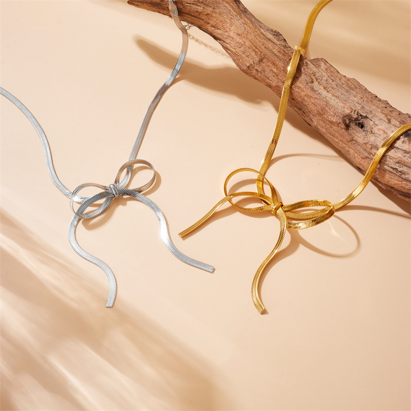 Korean style, fashionable, simple gold-plated stainless steel bow snake chain necklace
