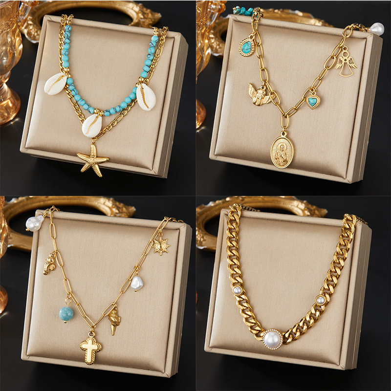 European and American retro oval logo pendant sweatshirt chain, versatile turquoise teardrop imitation pearl angel clavicle chain jewelry.