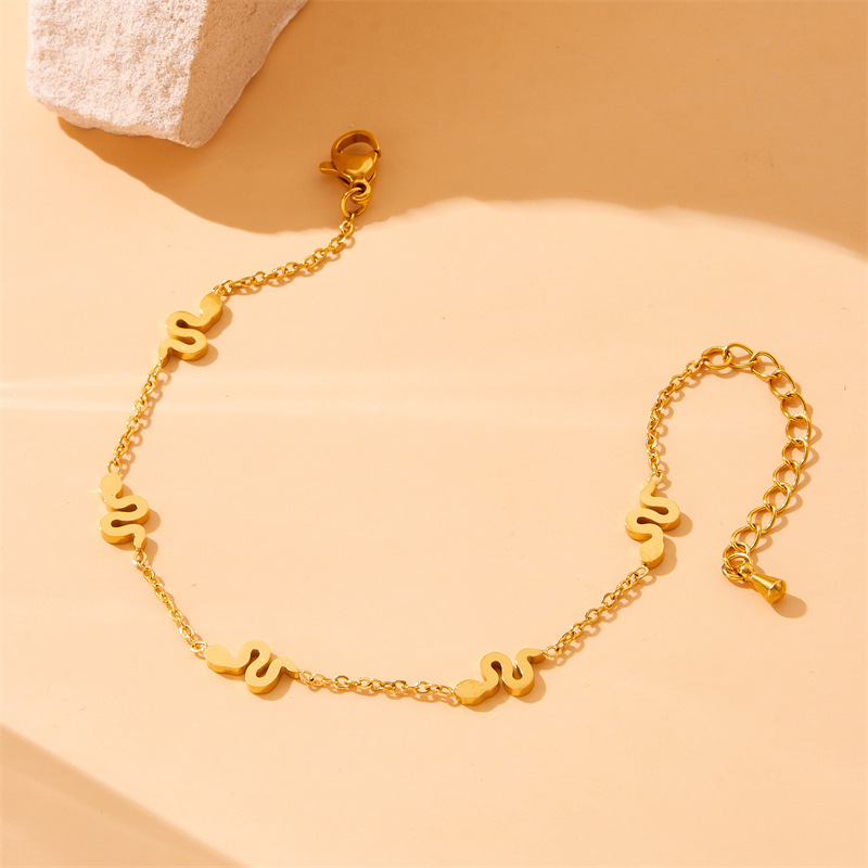 European and American cross-border fashion minimalist glossy gold-plated stainless steel snake accessories pendant chain necklace earring bracelet set