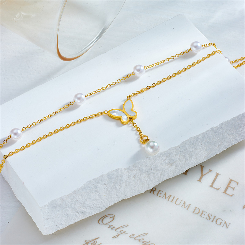 Korean style, fashionable, elegant, and luxurious multi-layered pearl butterfly tassel chain titanium steel versatile anklet