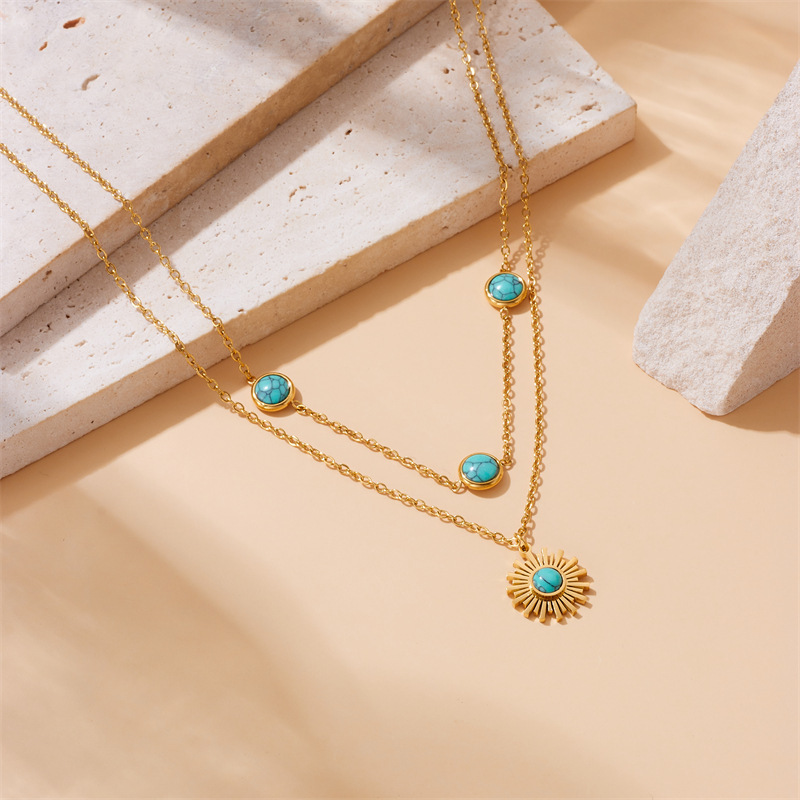 European and American style retro-inspired stainless steel double-layer necklace with turquoise sun pendant chain.