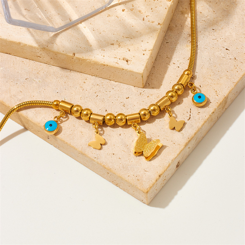 European and American style geometric beaded titanium steel butterfly blue eye pendant jewelry, versatile retro bracelet