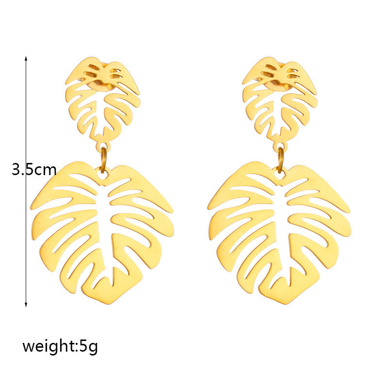 Niche fashion minimalist retro high-end creative leaf earrings, gold hollow titanium steel earrings.