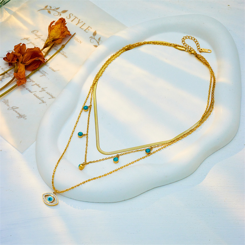 European and American cross-border fashion jewelry, multi-layered chain, turquoise, openwork, diamond-encrusted, blue eye pendant, clavicle necklace.
