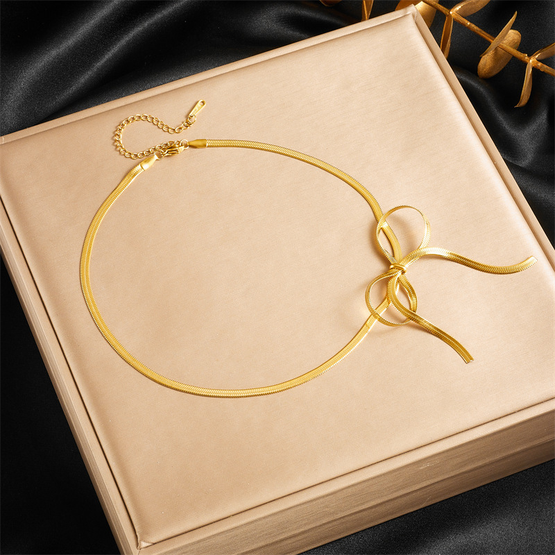 Cross-border fashion minimalist design gold-plated stainless steel bow snake chain accessory bracelet