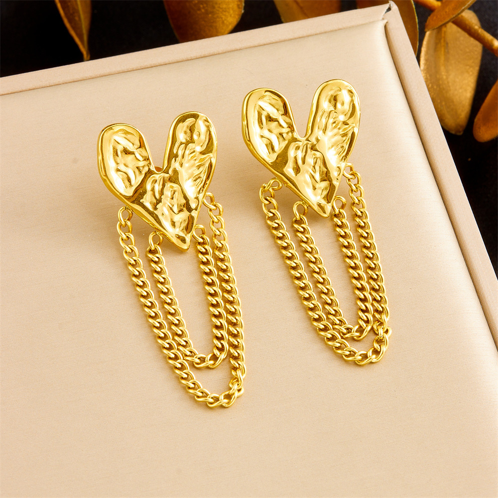 Cross-border fashion gold-plated diamond-encrusted sun heart flower bow tassel stainless steel light luxury high-end women's earrings
