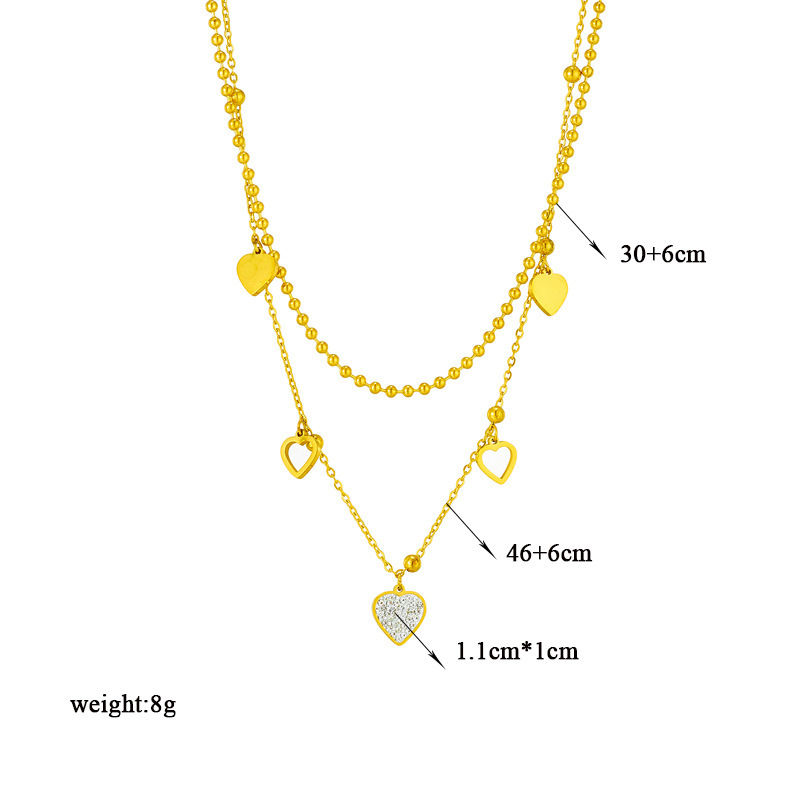 Fashionable double-layer titanium steel heart-shaped beaded necklace with diamond embellishments, a unique design.