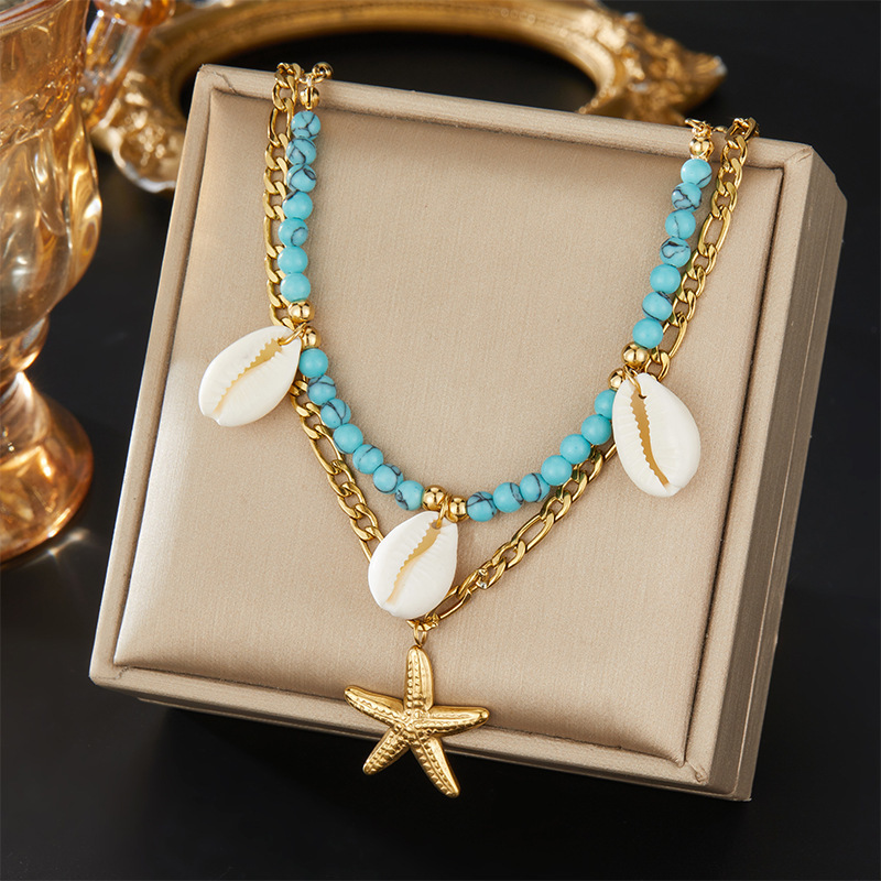 European and American retro oval logo pendant sweatshirt chain, versatile turquoise teardrop imitation pearl angel clavicle chain jewelry.