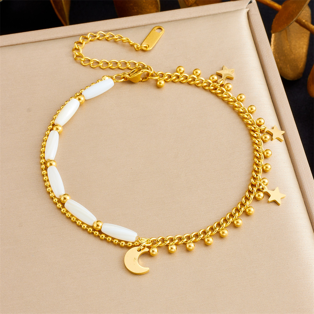 Fashionable and unique double-layer chain beaded gold-plated stainless steel anklet with five-pointed star and moon accessories for women.